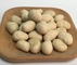 تنقلات بادام هندی با روکش کنجد آرد گندم سالم خوراکی هایی با طعم ترد و ترد